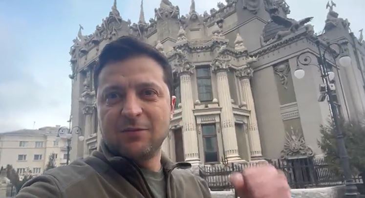 ‘Not Putting Down Arms’ Says President Zelensky as Russia Surrounds Capital
