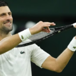 Novak Djokovic of Serbia celebrates after defeating Holger Rune of Denmark in their fourth round match at the Wimbledon tennis championships in London.