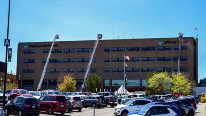 Firefighters at Jefferson Hospital in Pennsylvania managing the blaze that broke out on the roof.