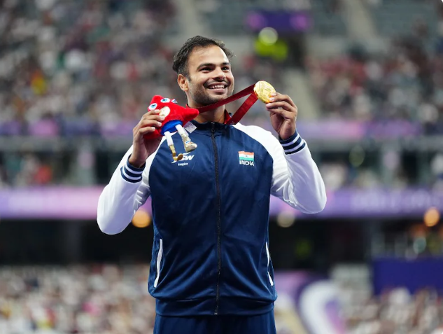 Indian athletes celebrating their achievements at the Paralympics, showcasing a record-breaking haul of 20 medals.