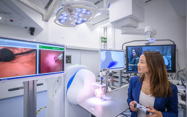 Surgeons use a game controller for remote magnetic endoscopy surgery 9,000 km apart, showcasing advancements in telemedicine and remote care.