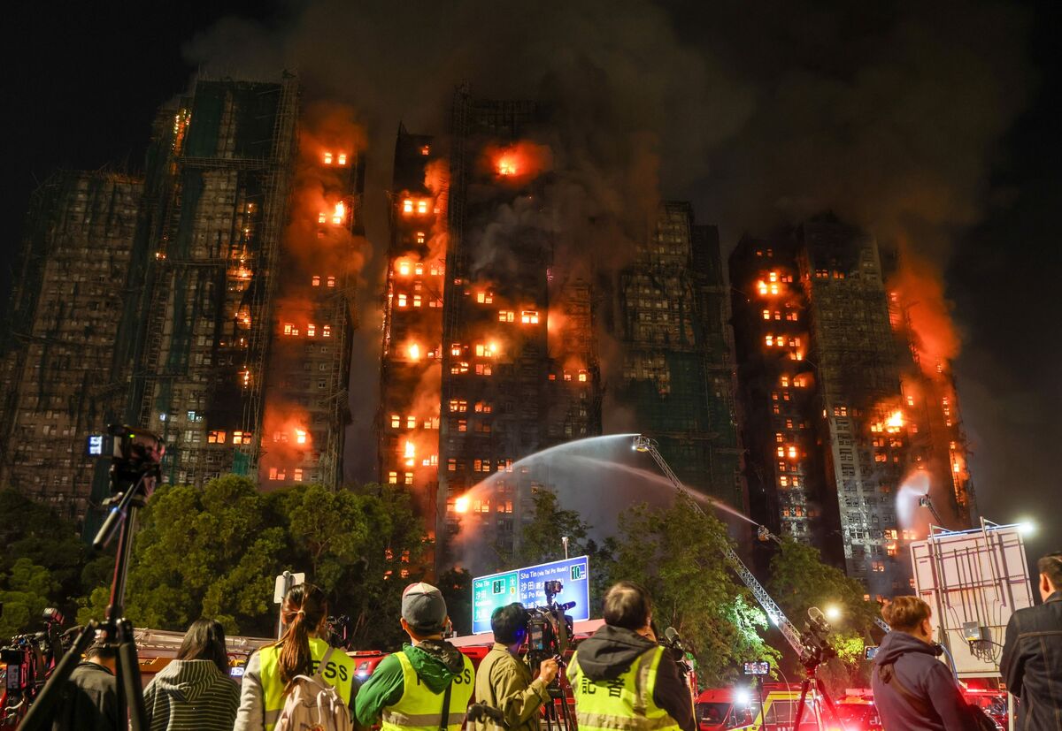 Flames and thick smoke rising from high-rise buildings at Wang Fuk Court, Tai Po, Hong Kong, during a massive fire that killed at least 44 people.