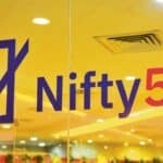 Deven Choksey shares market insights in an interview; Nifty 50 chart showing potential rise to 30,000.