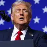 US President Donald Trump signing the bill requiring the Justice Department to release Jeffrey Epstein investigation documents.