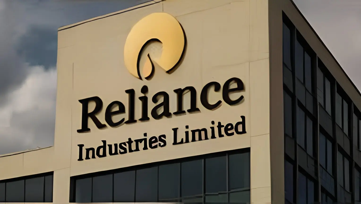 Reliance Industries stock chart rising to a new 52-week high with market data displayed on a digital trading screen