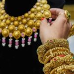 Gold jewellery displayed in a showroom in Kerala as gold prices fall below ₹92,000 per pavan