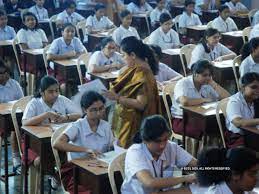 Students preparing for CBSE 2026 board exams with books and notes, highlighting the new 50% competency-based question pattern and dual exam sessions for Class 10.