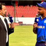 Kerala cricket team celebrating a wicket against Odisha