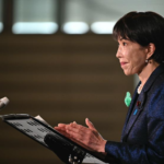 Japan Prime Minister announcing defense policy review panel amid rising regional threats